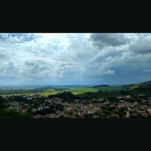 Aerial view of cityscape against sky