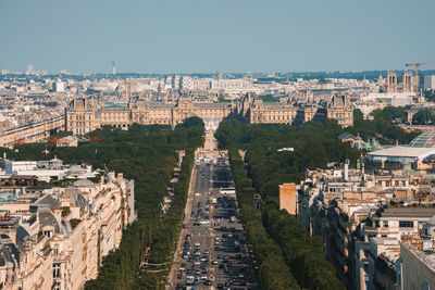 High angle view of buildings in city against clear sky