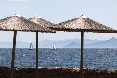 Thatched roofs against sea