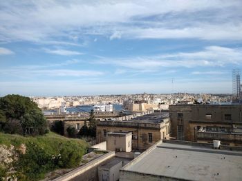 High angle view of buildings against sky