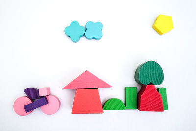 High angle view of toys against white background