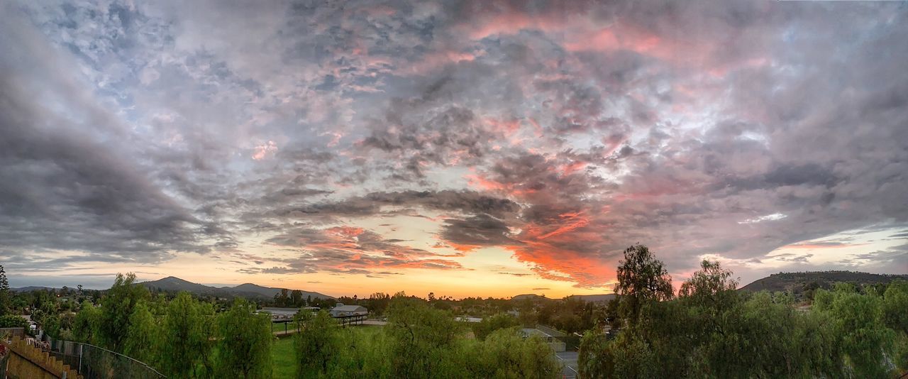 sky, cloud, sunset, environment, landscape, beauty in nature, nature, scenics - nature, plant, dramatic sky, panoramic, land, tree, mountain, sun, no people, outdoors, tranquility, cloudscape, multi colored, travel, architecture, travel destinations, rural scene, forest, sunlight, grass, evening, dusk, storm, tranquil scene, moody sky, field, social issues, orange color