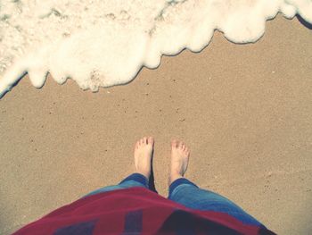 Low section of woman on beach