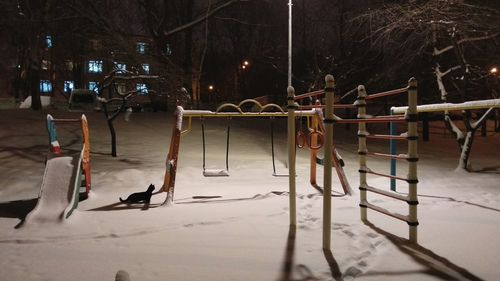 Snow covered city at night