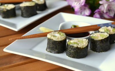 Close-up of sushi served on table