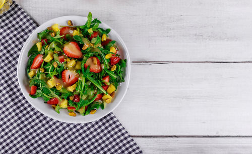 High angle view of salad in bowl on table