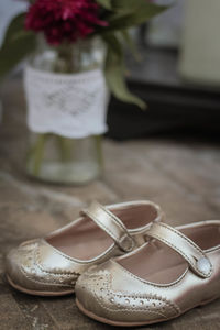 Close-up of shoes on table