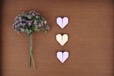 Directly above shot of heart shape on white table