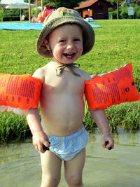 Portrait of cute boy at sea