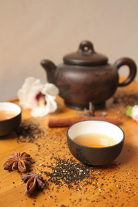 Still life with japanese tea set - small tea pot and two little cups