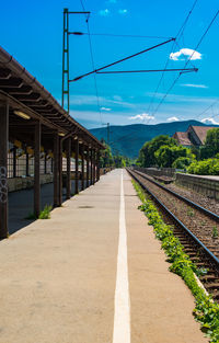 Railroad tracks against sky