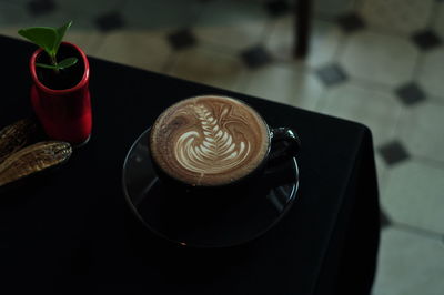 Coffee cup on table