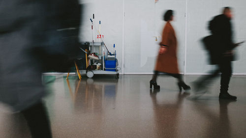 People walking on floor in building