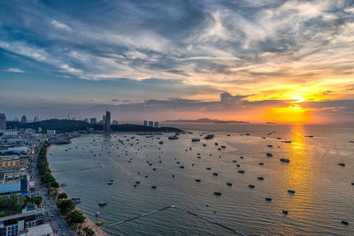 High angle view of city at sunset