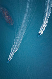 Aerial view of sailboat in sea