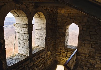 View of historical building seen through arch