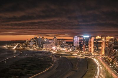 High angle view of light trails on road at night