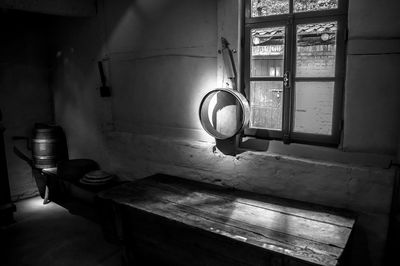 Lamp post in dark room