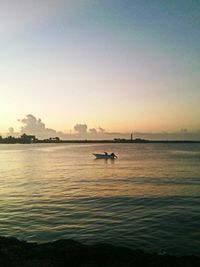 Scenic view of sea at sunset