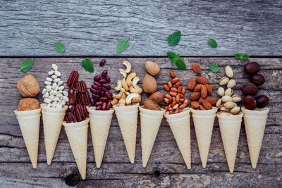 Directly above shot of nuts in ice cream cones