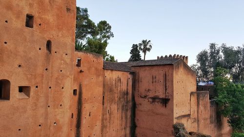 Low angle view of old building against sky