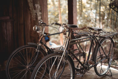 Bicycles parked by old house