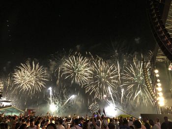 Firework display at night