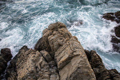 High angle view of rocks on beach