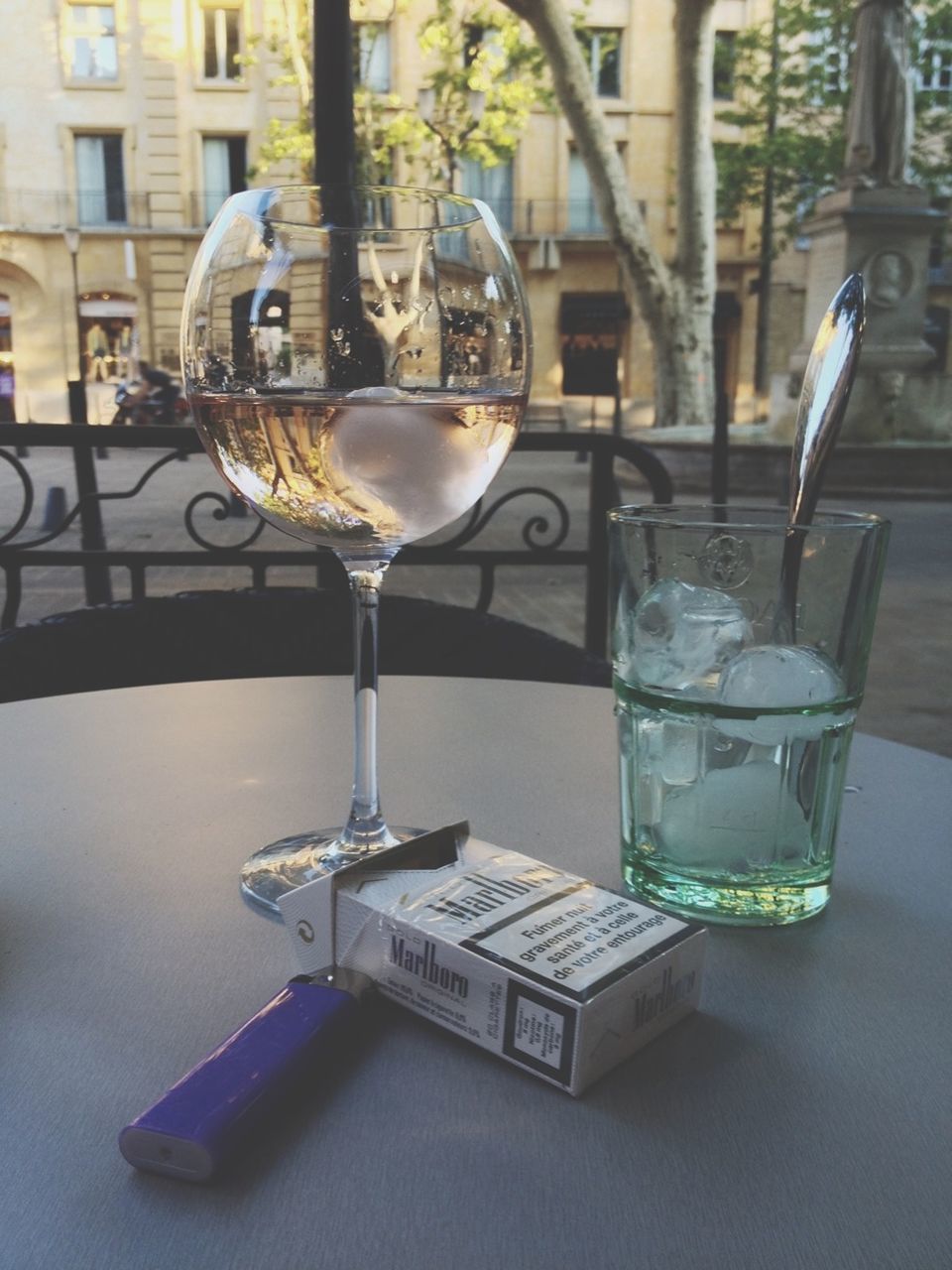 table, drink, chair, food and drink, indoors, restaurant, glass - material, drinking glass, refreshment, still life, wineglass, built structure, architecture, empty, absence, building exterior, focus on foreground, transparent, day, close-up