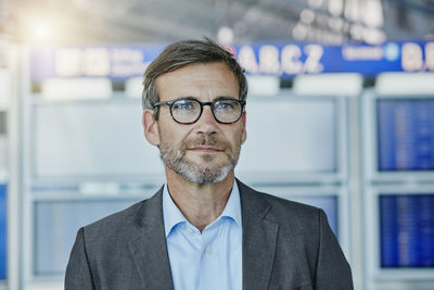 Confident businessman at the airport