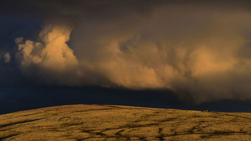 Scenic view of dramatic sky during sunset