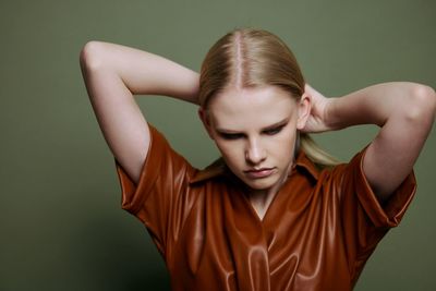 Young woman with arms crossed