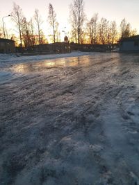 Scenic view of frozen lake against sky during winter