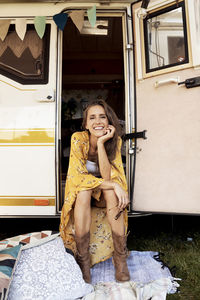 Portrait of woman sitting in car
