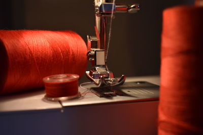 Close-up of sewing machine and thread 