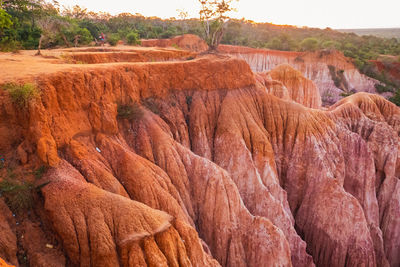 Tourists at marafa depression - hell's kitchen at sunset in malindi, kilifi county, kenya