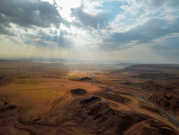 Scenic view of desert against sky