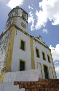 Low angle view of old building against sky