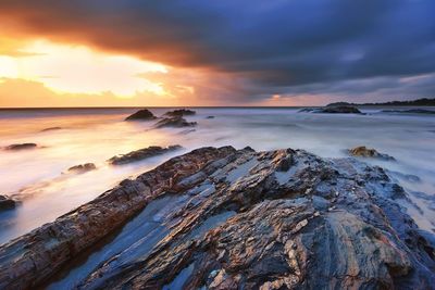 Beautiful sunrise over the rocky beach