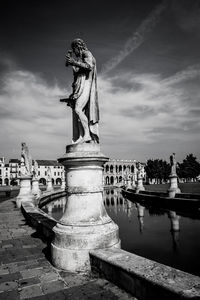 Statues against building