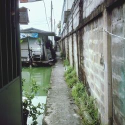 Canal amidst buildings in city