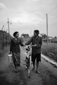 Walk for gardening planting rice use his bike