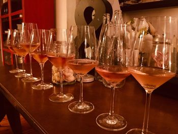 Close-up of wine glasses on table in restaurant