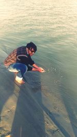 Man in a boat in sea