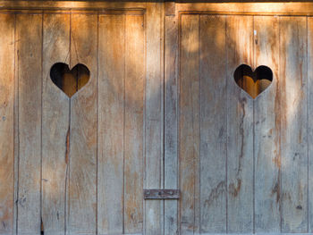 Close-up of heart shape on door