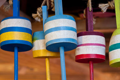 Close-up of multi colored wooden decoration hanging