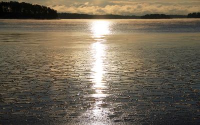 Scenic view of sunset over river