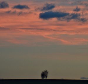 Scenic view of landscape at sunset