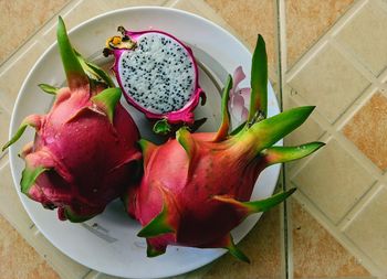High angle view of fruits in plate on table