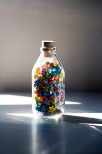 Close-up of glass jar on table